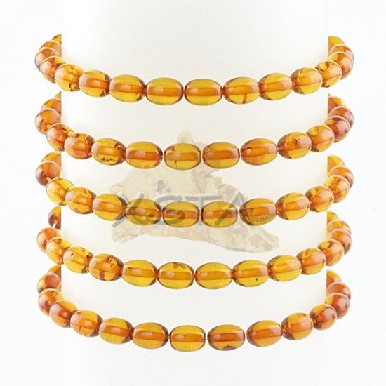 Amber bracelet cognac color olive